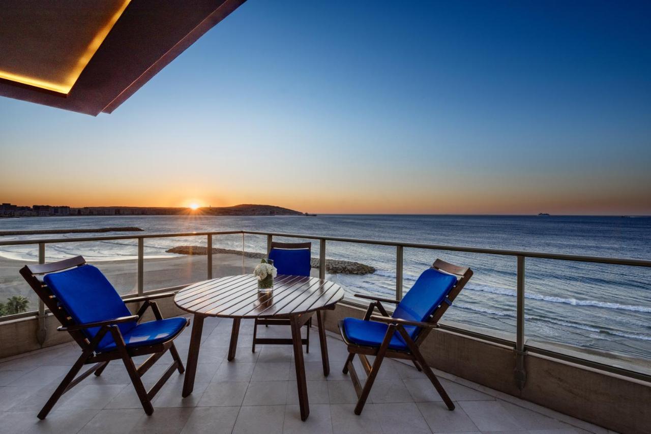 Moevenpick Hotel & Casino Malabata Tanger Εξωτερικό φωτογραφία Sunset at the beach